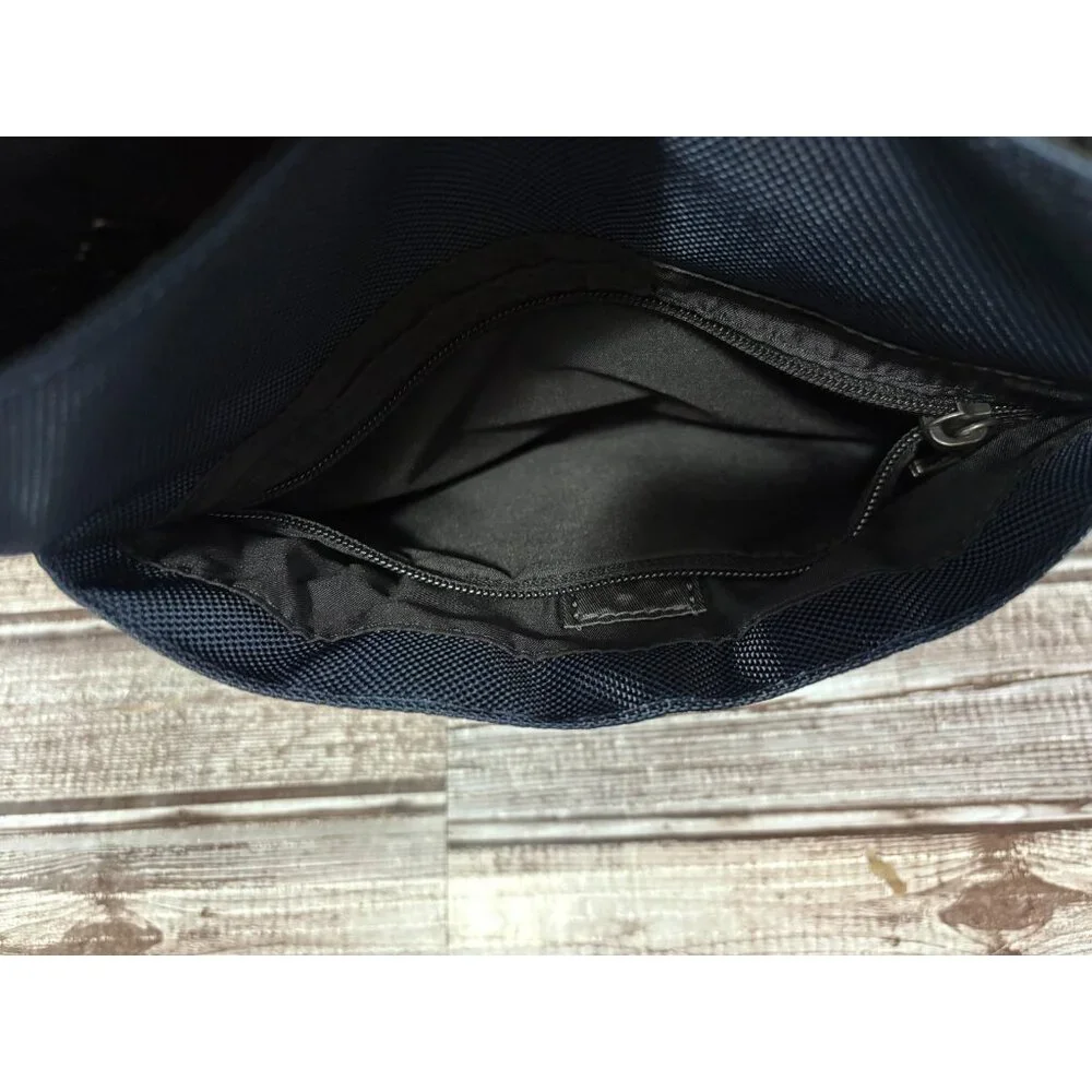 Tumi Fremont KERBY 9.5” Sling Crossbody Bag color NAVY BLUE NWT mspr $295
